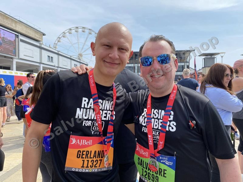 Salvatore and his son with their medals after the Bristol 10K in May 2023