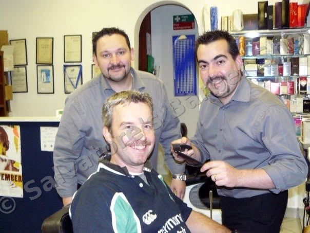 The barbers with their Movember moustaches, November 2009