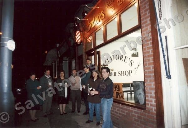 Opening night in April 1994: family and friends outside the new shop under its lit fascia